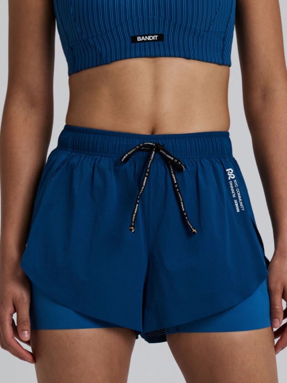 Bandit WOMEN'S VENTO 2-IN-1 RUN SHORT - INK BLUE / AEGEAN